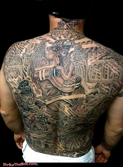 firefighter with full back memorial tattoo
